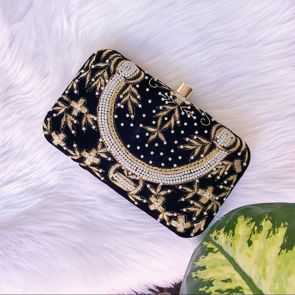 navy embellished clutch bag